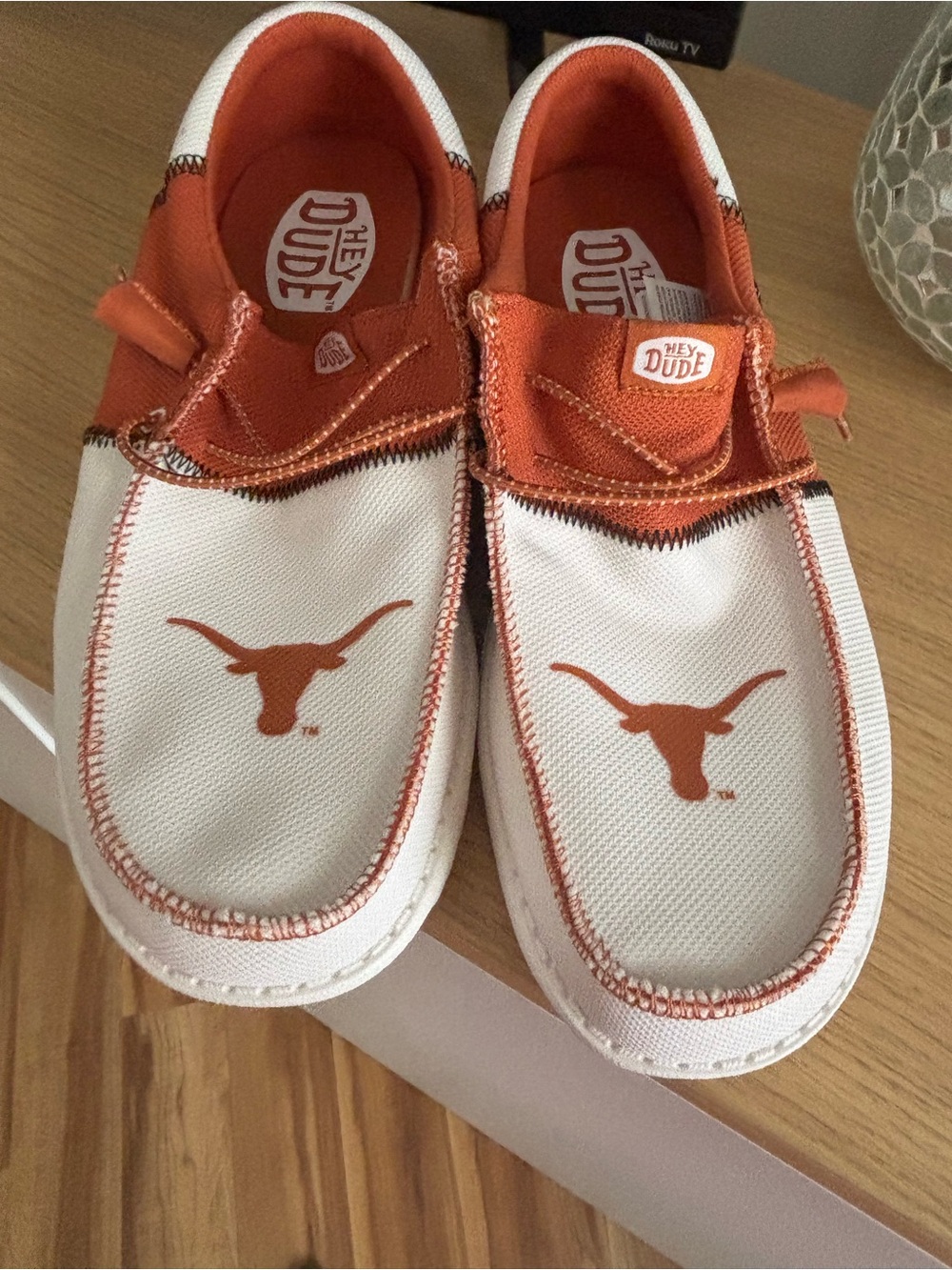 Hey Dude Men's Slip-On Loafers in White and Orange with Longhorn Logo